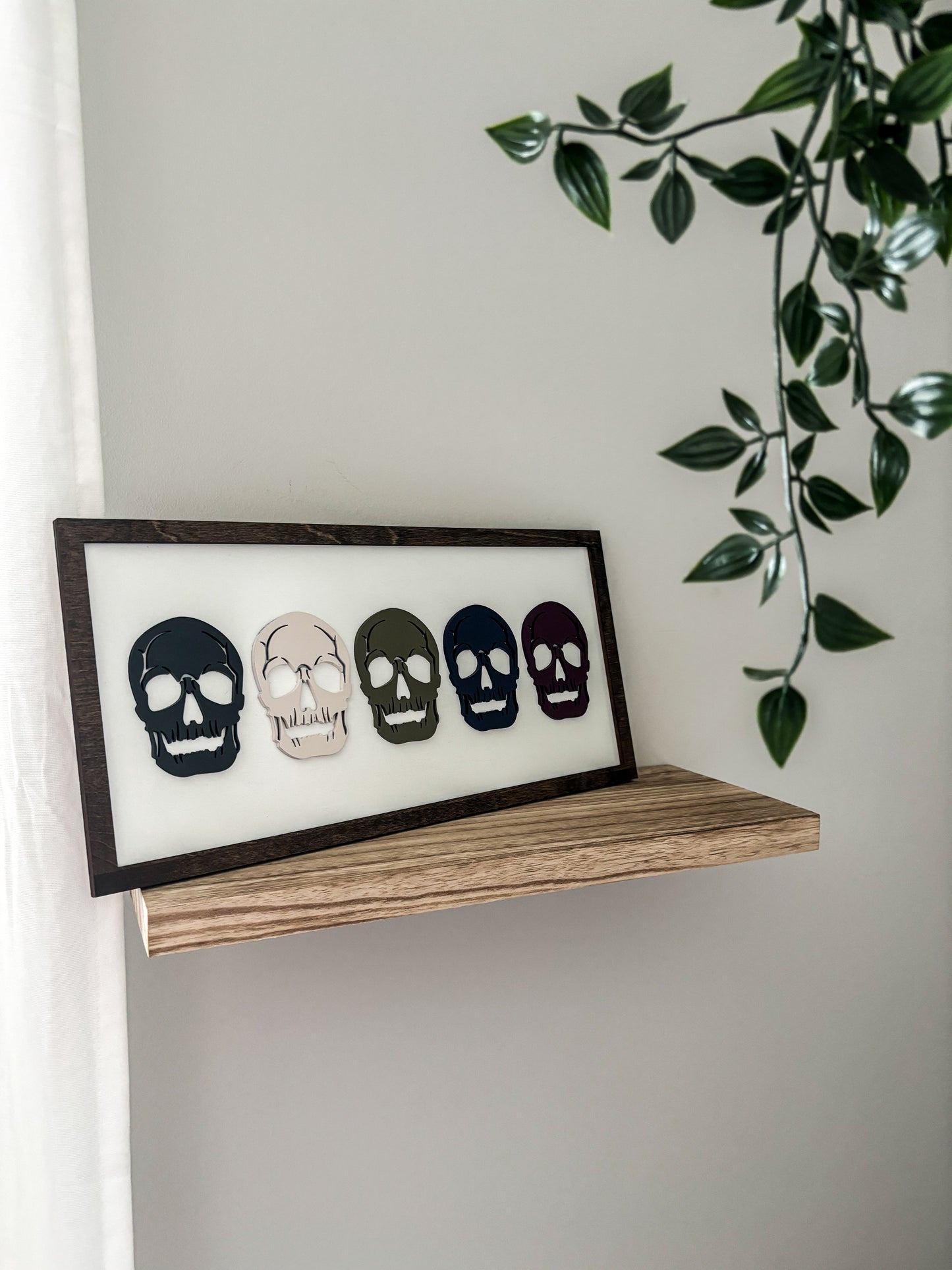 Framed Halloween Skeleton Heads Sign